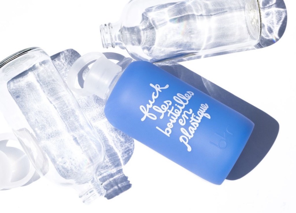 Romeo F*ck Les Bouteilles En Plastique • Sheer periwinkle blue with white&nbsp;text